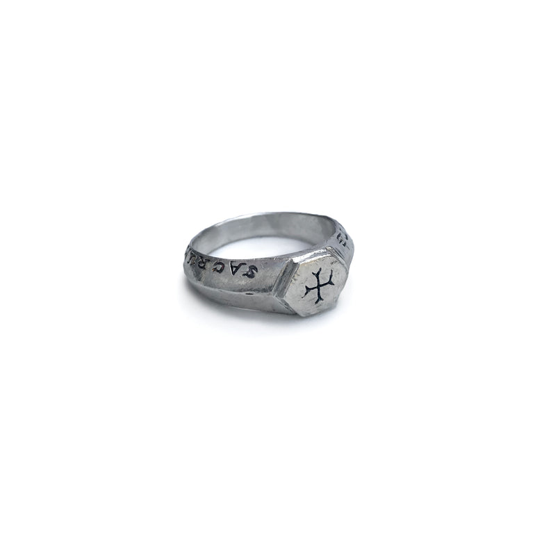 image of silver Sumerian cross ring with Latin words Sacrum Caritate for Sacred Love