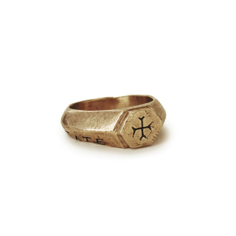 image of bronze Sumerian cross ring with Latin words Sacrum Caritate for Sacred Love