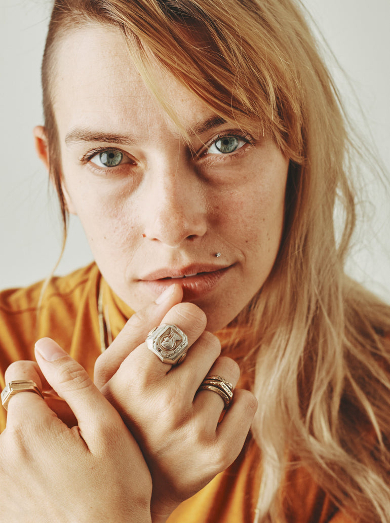 image of woman wearing Mother Mary sterling silver souvenir ring